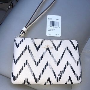 Brand new chevron print coats wristlet. Never used